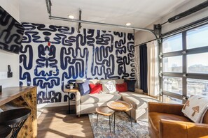 Queen Sofa Bed. Privacy/Room darkening curtains on Garage Door.