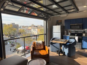 Juliet/Garage Door Balcony. Overlooking Campus & Farmer's Market (in season).