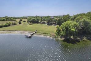 Take in the peace and quiet on the private lake on 42 acres
