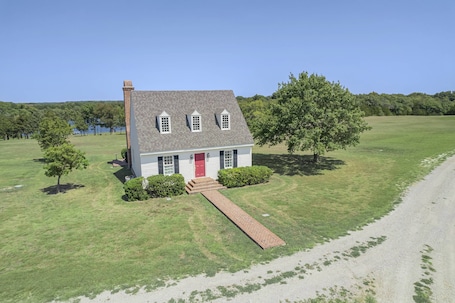French-inspired cottage on 42 acres | Serene lake views | Enjoy timeless charm, modern comforts, and peaceful sunsets in a private countryside retreat