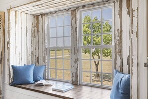 Cuddle up to a book and enjoy the view of the country
