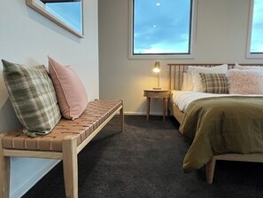 Spacious Master bedroom is a real delight. 
Wake up a the beautiful glow of the sun rising on the dunes .
Direct ensuite access can be shared with the bunk room or blocked off. Huge WIR has loads of room for your clothes and travel essentials. 