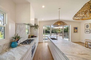 Cook up a storm in this amazing kitchen. Not one but TWO dishwashers with everything you could possibly need to prepare a feast during your stay. 