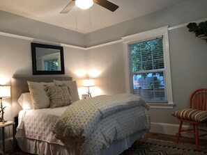 First Bedroom with roomie closet and dresser.