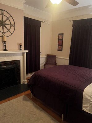 Downstairs bedroom with half bath