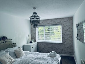 Very comfortable double bed with fresh linen & drawers. 