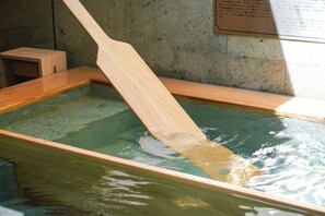 Relax and unwind in the open-air bath in your room