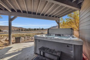 Exterior: Patio, private 5-person hot tub, serene mountain views
