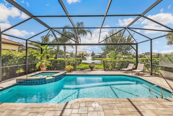 Spend your SW Florida vacation in this upscale, heated pool home, in Somerset at The Plantation - one of Fort Myers most desirable gated communities.