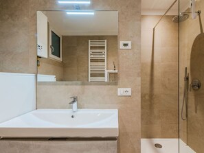 Bathroom, Plumbing Fixture, Flooring, Wall, Bathroom Sink, Interior Design, Floor, Sink, Tap, Mirror