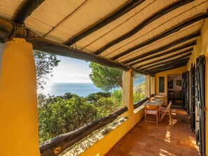 Sky, Shade, Water, Wood, Plant, Building, Tree, Porch, Outdoor Furniture, Cottage