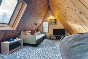 Loft lounge with a twin-size bed.