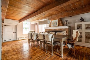 Bright, warm dining room with more than enough seating