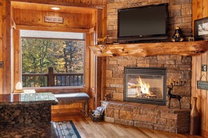 Kick back & relax in the living room with a fireside movie night