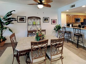 Dining Area - Table Seats Six - Breakfast Bar Seats Two