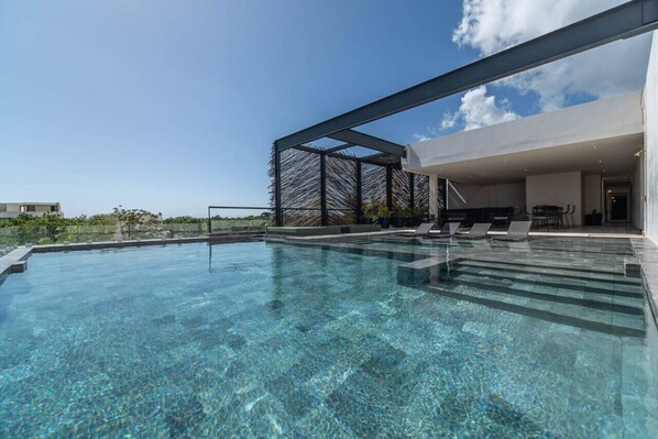 Dive into relaxation with our refreshing pool, perfect for a sunny day