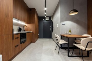 Dining Area and the Kitchen | Book Now with RENTUJEMY.COM"