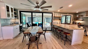 The dining area has seating for 10 and access to the pool.
