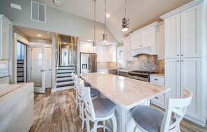 Kitchen island which can seat three
