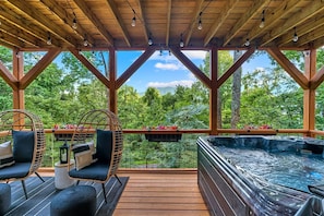 Lower deck features a hot tube overlooking views of the Blue Ridge Mountains.