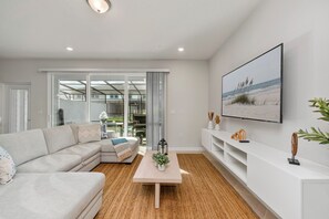 Enjoy a cozy movie night with ample plush seating for ultimate comfort.