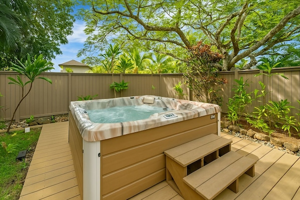 Private back patio with rain shower and hot tub
