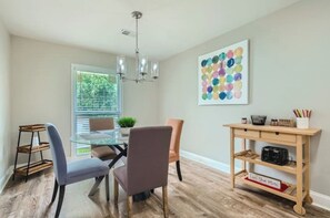 A cozy dining area, thoughtfully designed to seat 4 people.




