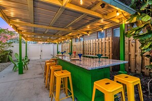 Tiki Bar and Side chairs ready for cocktail hour.