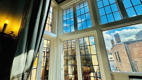 The Vista Bedroom is a serene retreat with high ceilings that create a spacious & airy ambiance. 