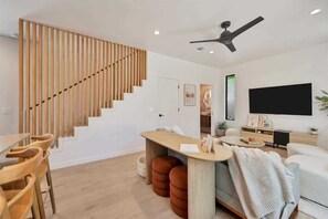 Kick back in a cozy living room with plenty of seating for everyone.