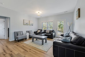 Living area with comfortable sofas and chairs for downtime relaxation.