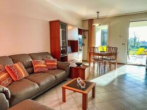 Furniture, Couch, Property, Picture Frame, Table, Interior Design, Wood, Flooring, Window, Living Room