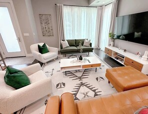 Cozy chairs, perfect for relaxing in the main entertainment area.