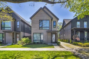 A front view of our home, including the shared driveway.
