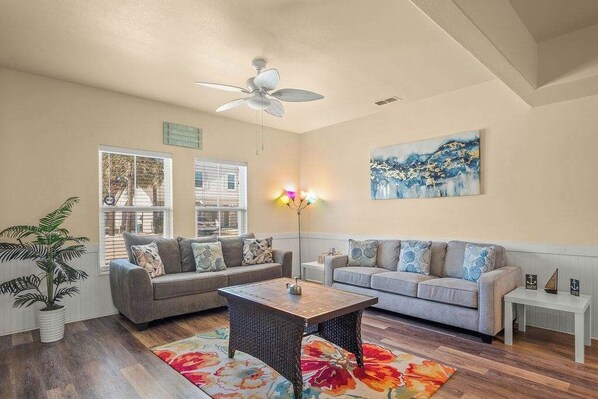 Make yourself at home in our bright and airy living room, a perfect space for relaxation.