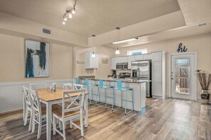 Enjoy seamless flow in our open-concept dining and kitchen area, perfect for cooking and gathering