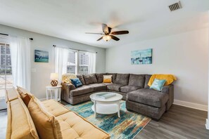 This living room has a queen sleeper sofa with a memory foam mattresses to ensure a comfortable night's sleep. Upper Level