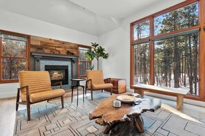 Sitting room with fireplace, main level.