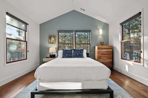 Master bedroom with tv and ensuite bath, upstairs.