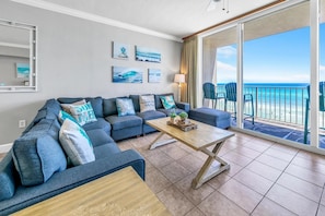 Open concept living area with comfortable furnishings TV