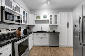 Indoors, Kitchen, Microwave, Oven, Refrigerator