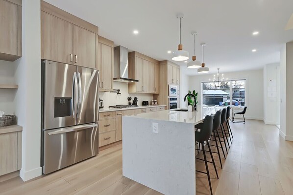 Bright and open layout, perfect for gathering while cooking.