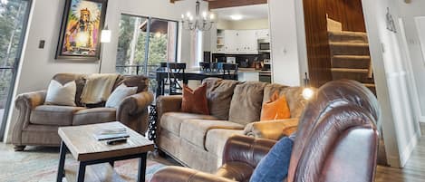 Living room and upstairs loft area