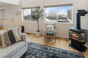 View from living room, with cozy gas fire place.