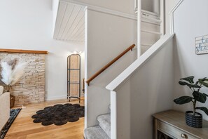 Stairway to upstairs sleeping loft and bedroom