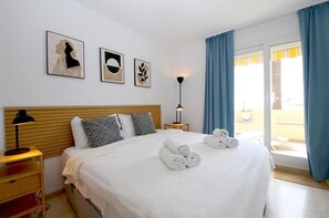 Master bedroom with king-size bed and en-suite bathroom