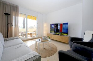 Bright and spacious lounge area with air conditioning and comfortable seating