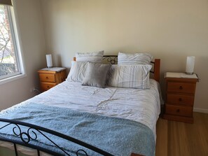 Queen bed in main bedroom