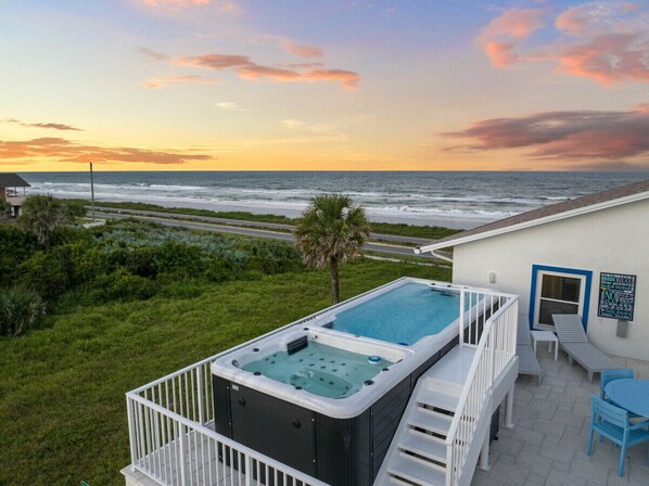 Swim spa offers the best of both worlds. Hot tub and pool in one!