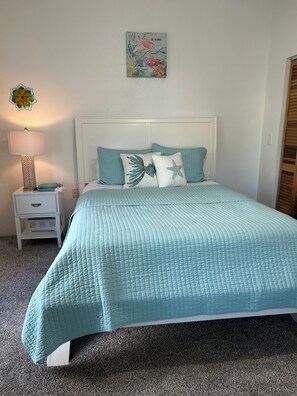 Queen bed and nightstand.
